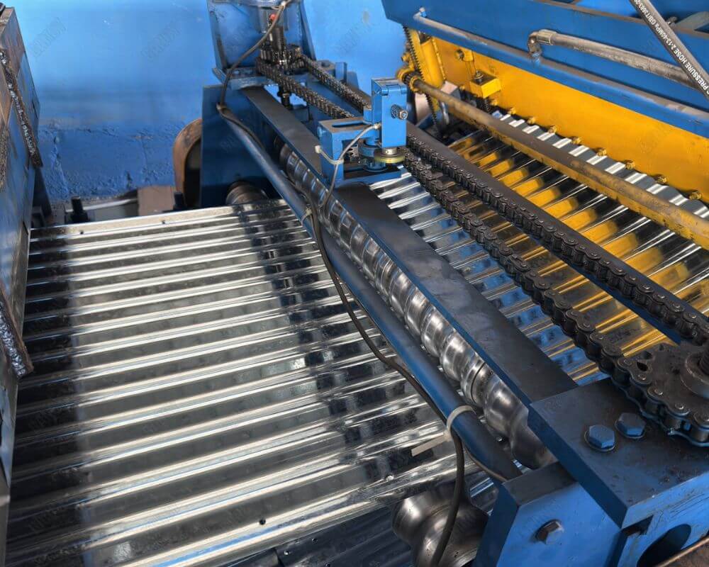 Machinery used in the fabrication of tank parts, highlighting precision tools