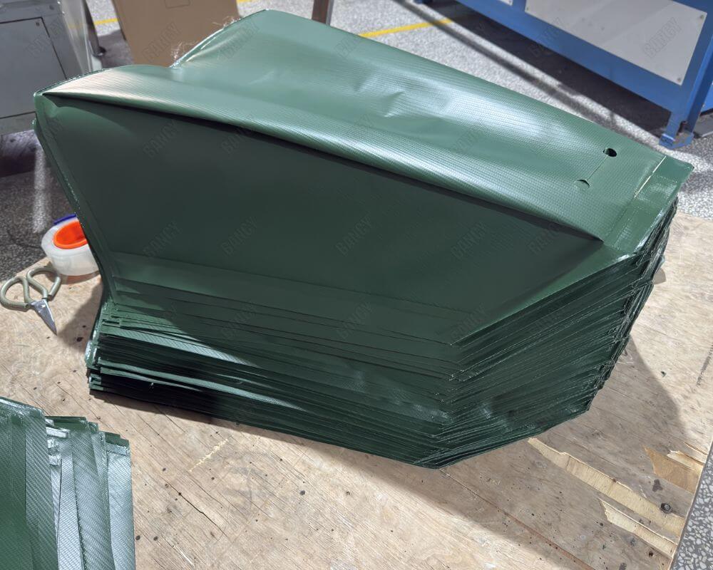 Stacked curved metal sheets used for constructing aquaculture tanks
