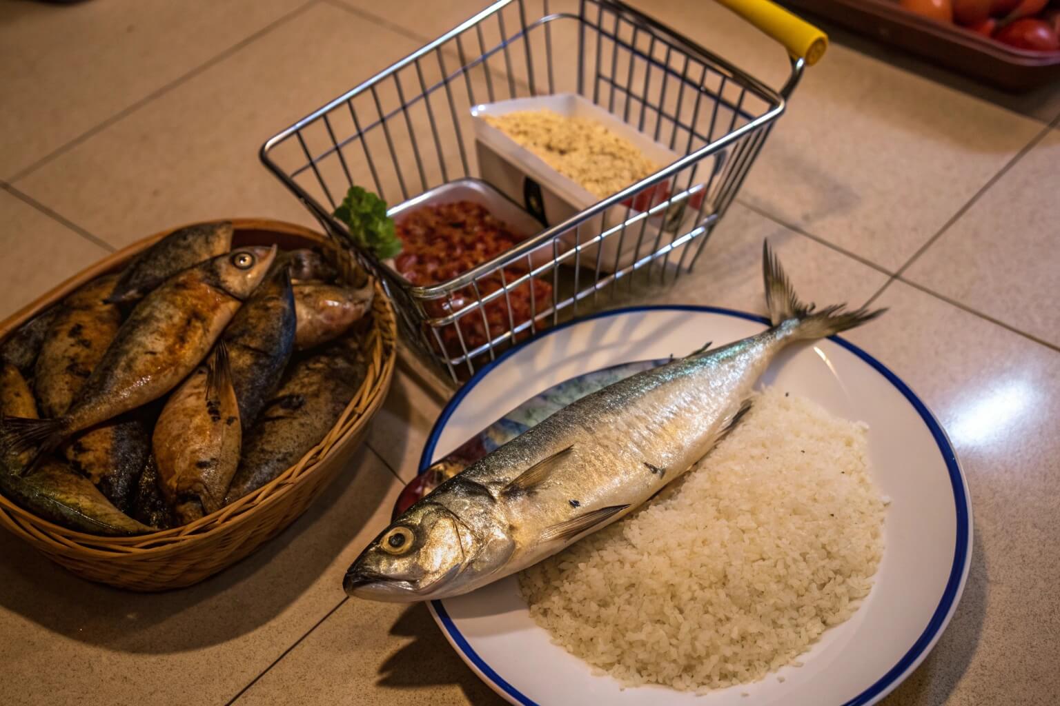Display of various imported food items in Ghana with fish prominent