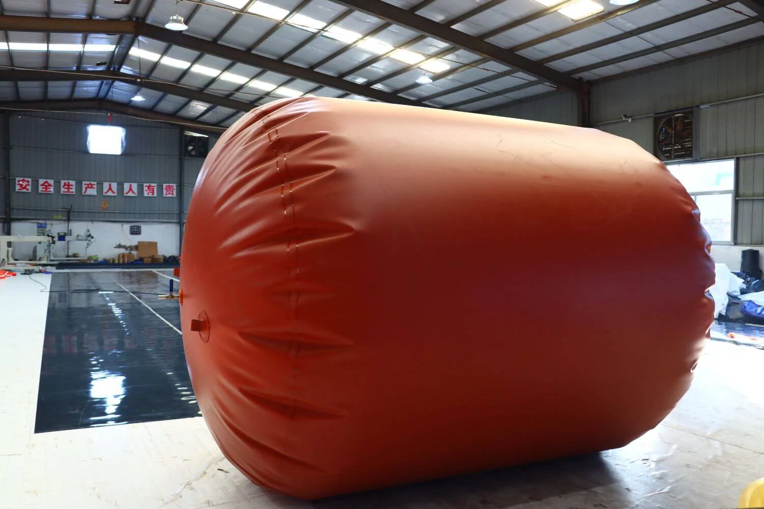 Reinforced flexible tank undergoing a 24-hour inflation test to ensure absolute air tightness.