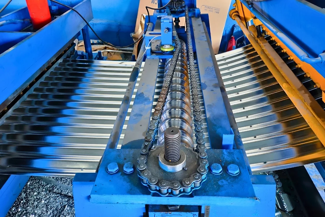 Precision roll forming machine producing 80g corrugated galvanized steel panels in Bancy factory.