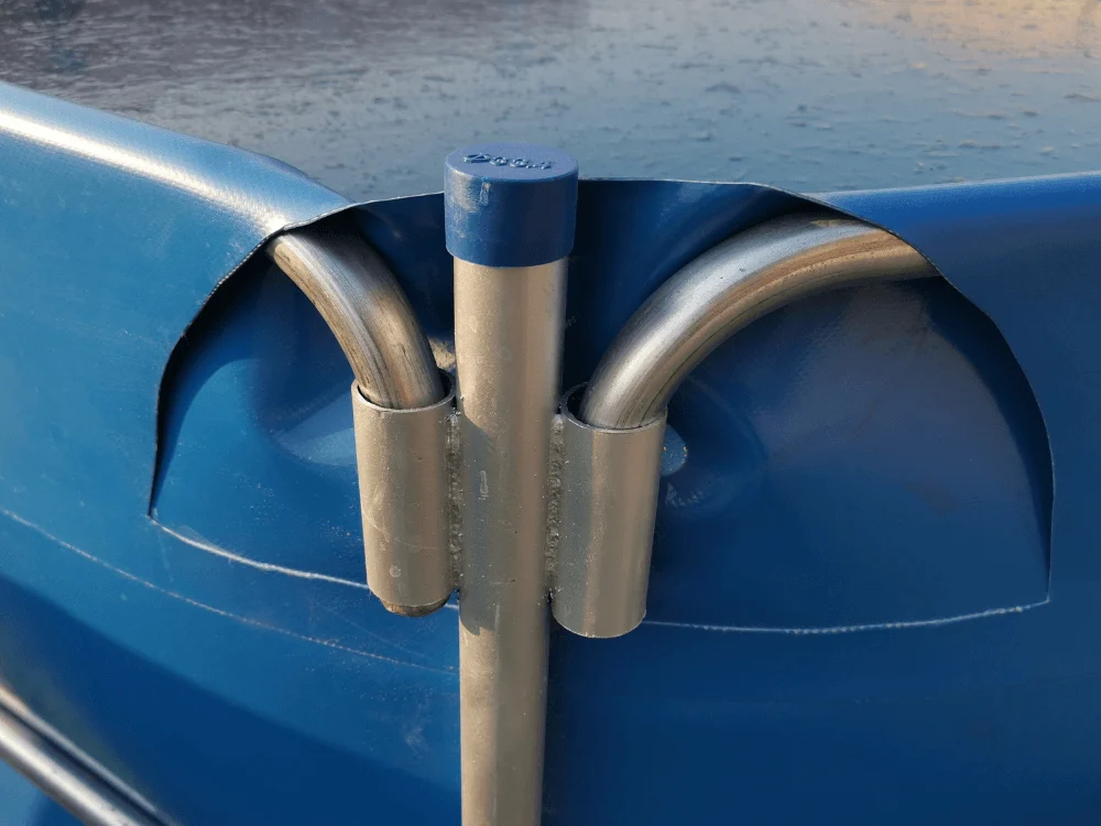 Close-up of hot-dip galvanized pipe connection showing tool-free plug-in assembly without screws.