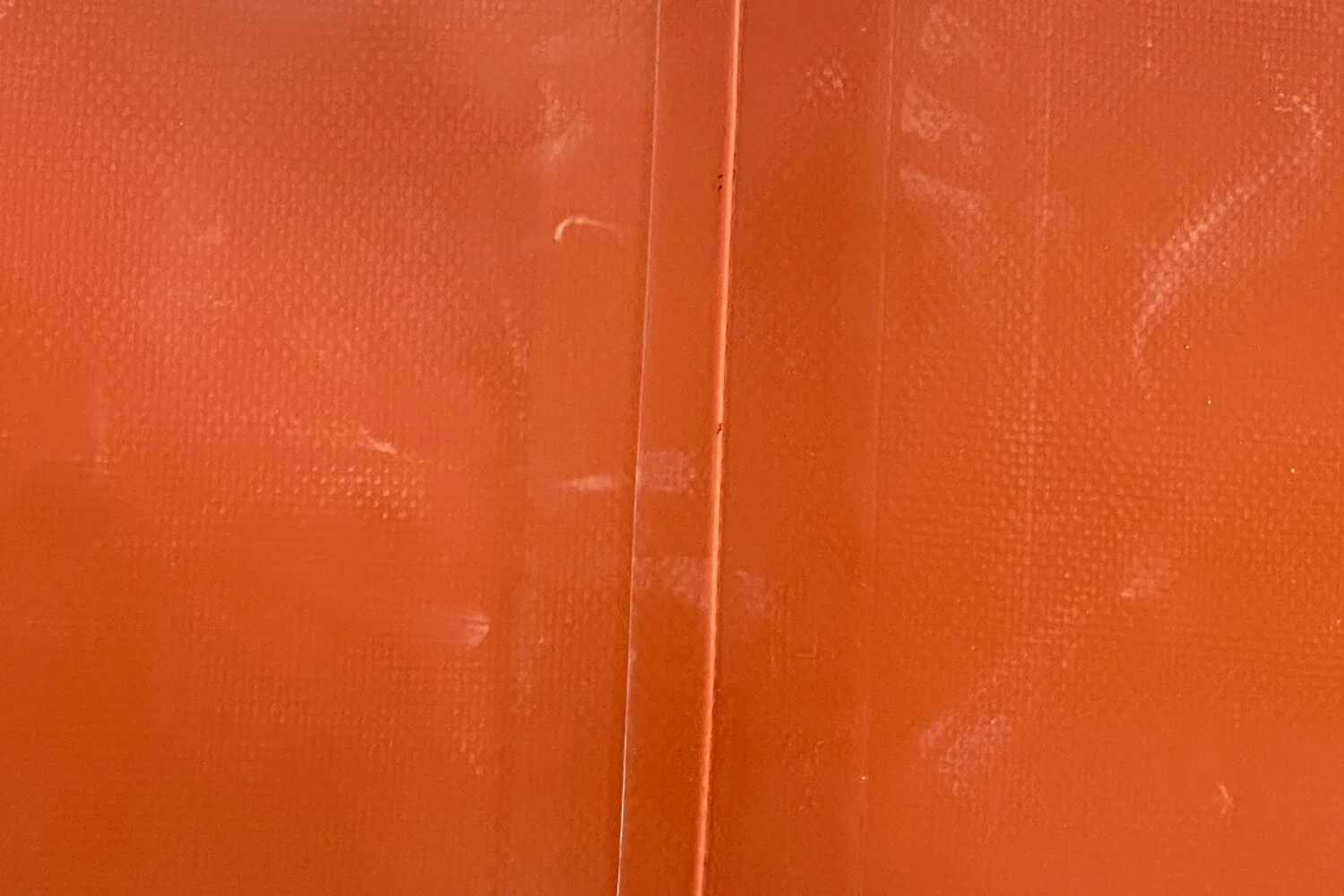 Macro shot of double-layer hot air welding seam on the bottom of the fire fighting water tank