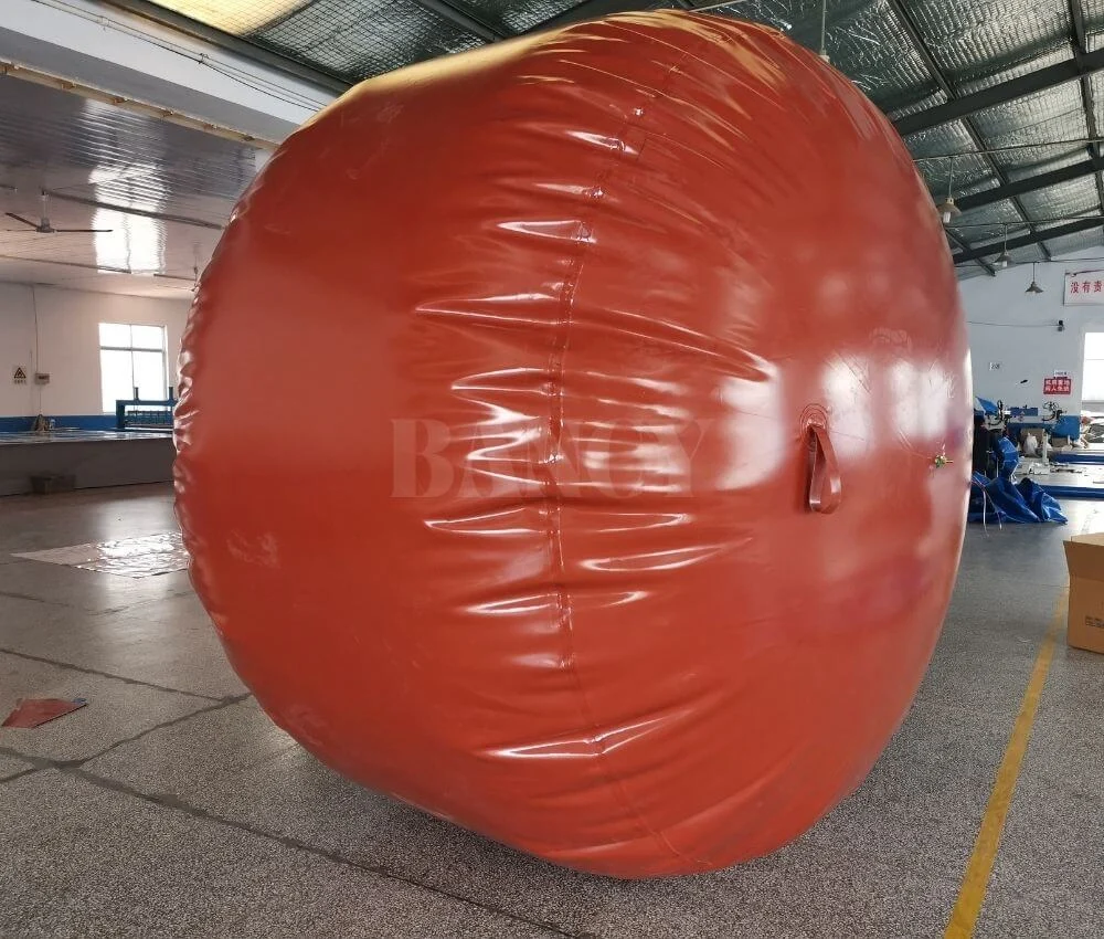 Side view of a large volume biogas accumulator for anaerobic digestion setup.