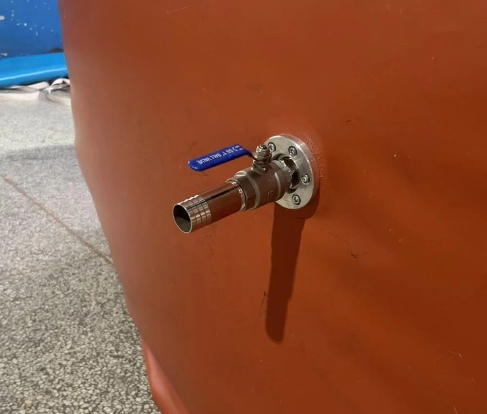 Industrial-Grade Biogas Valve Close up of reinforced tie-down anchor loops on a flexible red mud biogas holder.