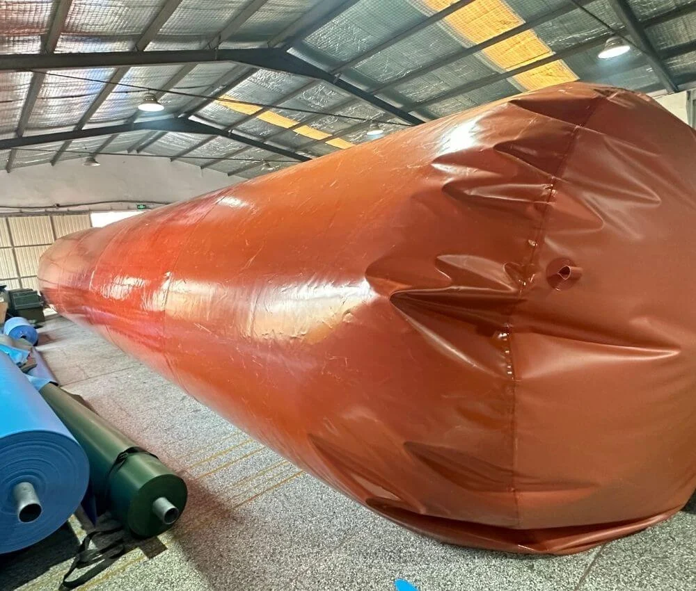 Optimized Low-Pressure Design Detailed view of the black double-layer reinforced welded seam on red mud biogas fabric.